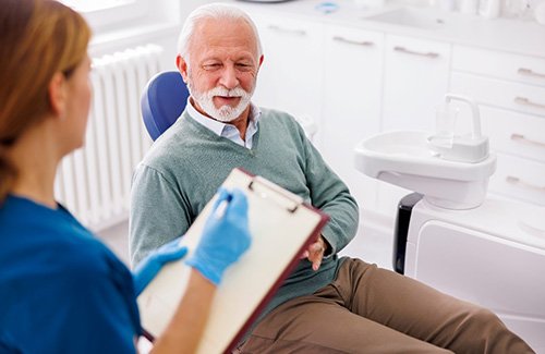 a patient during a dental consultation