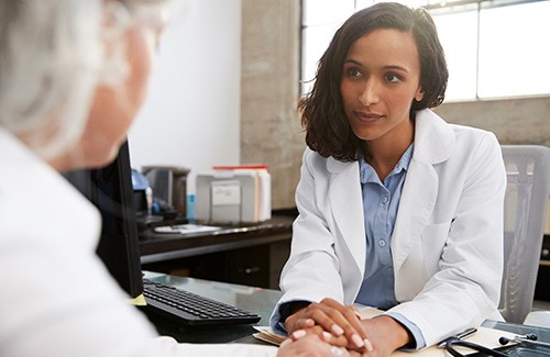 Woman speaking to a doctor